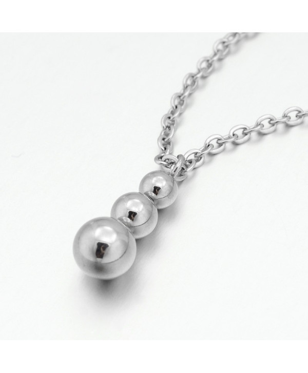 Conjunto colgante y pendientes bolas